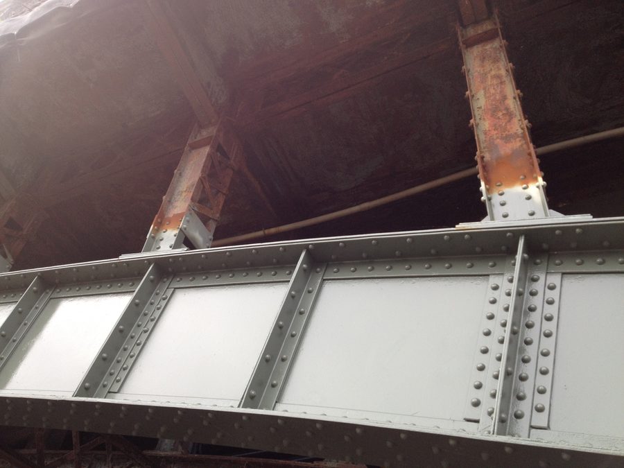Riveted bridge steel after repair, newly painted